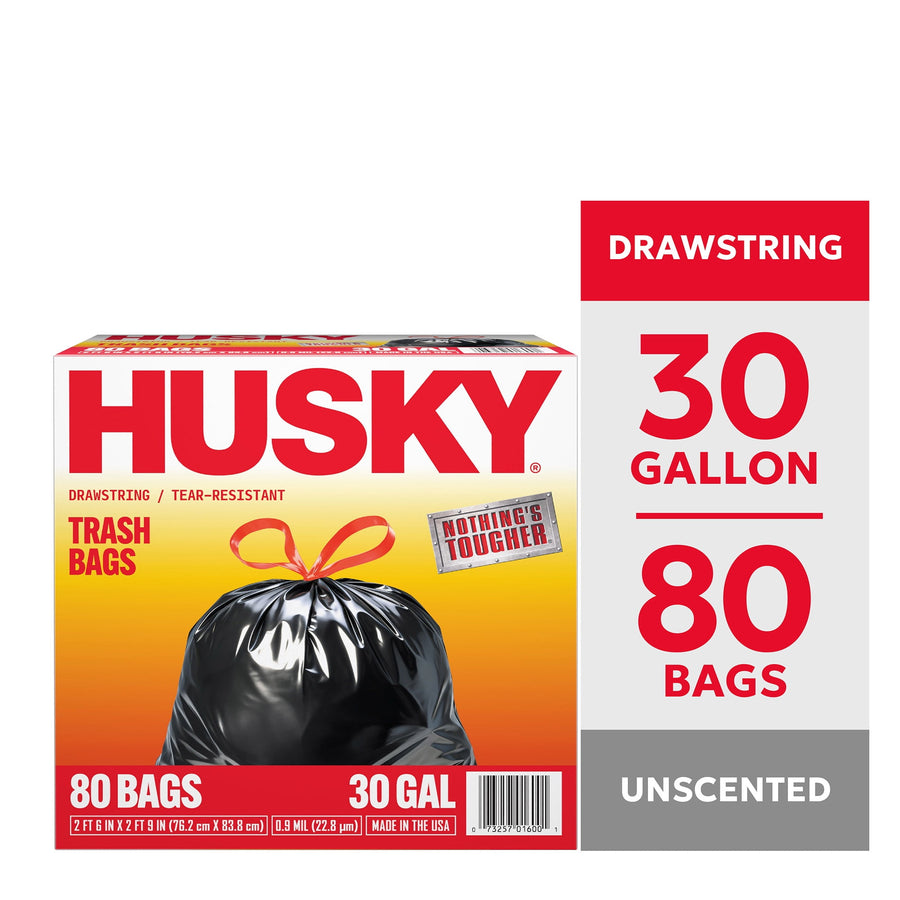 Boxed Husky 30 gallon drawstring trash bags with bold HUSKY logo and black tied bag image