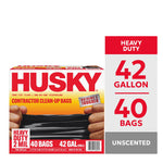 Husky branded box of contractor clean-up bags showing hands stretching a black bag and text indicating 42 gallon, 40 bags