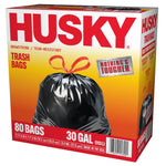 Angled view of Husky trash bag box showing large logo, tied black bag image and 80 bags 30 gal labeling