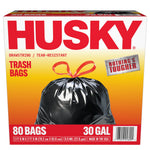 Front-facing Husky box showing large HUSKY logo, black tied trash bag image and 80 bags / 30 gal callout