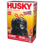 Three-quarter view of Husky yard bag box showing brand logo, tied black bag image, and product specifications on the side.