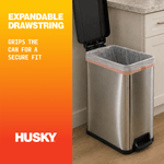 Image of a trash can lined with a Husky drawstring bag with text about expandable drawstring gripping the can