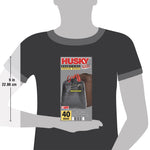 Graphic silhouette holding a Husky trash bag package image to show package dimensions with a 9 inch height marker