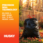 Husky lifestyle-style image of a tied black yard bag on grass and leaves with text about precision seal technology.