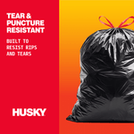 Close-up Husky graphic with large tied black trash bag and text highlighting tear and puncture resistant construction.