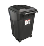 Angled view of a black Hyper Tough wheeled outdoor trash can with attached hinged lid and label on front.