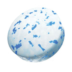 Close-up photorealistic mint with white surface and blue speckles, representing Ice Breakers coolmint candy