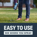Person aiming IMAGE weed killer foaming spray at a lawn weed, lower body and can visible