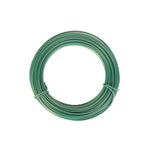 Isolated circular coil of green plastic-coated garden wire photographed on a white background