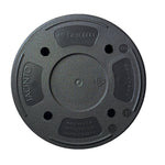 Underside view of a round black planter showing molded brand text, drain holes, and markings