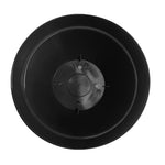 Top-down view into a black plastic planter showing the interior base and central raised area with drainage notches.
