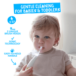 Toddler holding a Jack N' Jill Tickle Tooth sonic toothbrush with LED light, product feature icons at left