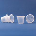 Three clear ribbed plastic sample cups arranged on a blue background showing the cup shape and texture