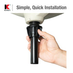 Hand installing a black plastic sink drain tailpiece under a white basin illustrating simple installation