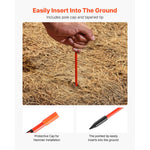 Close-up of a hand inserting an orange marker pole into dry ground with inset images of a protective cap and pointed tip.