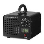 Black portable ozone generator showing timer knob, vented front face, small LCD and red indicator light