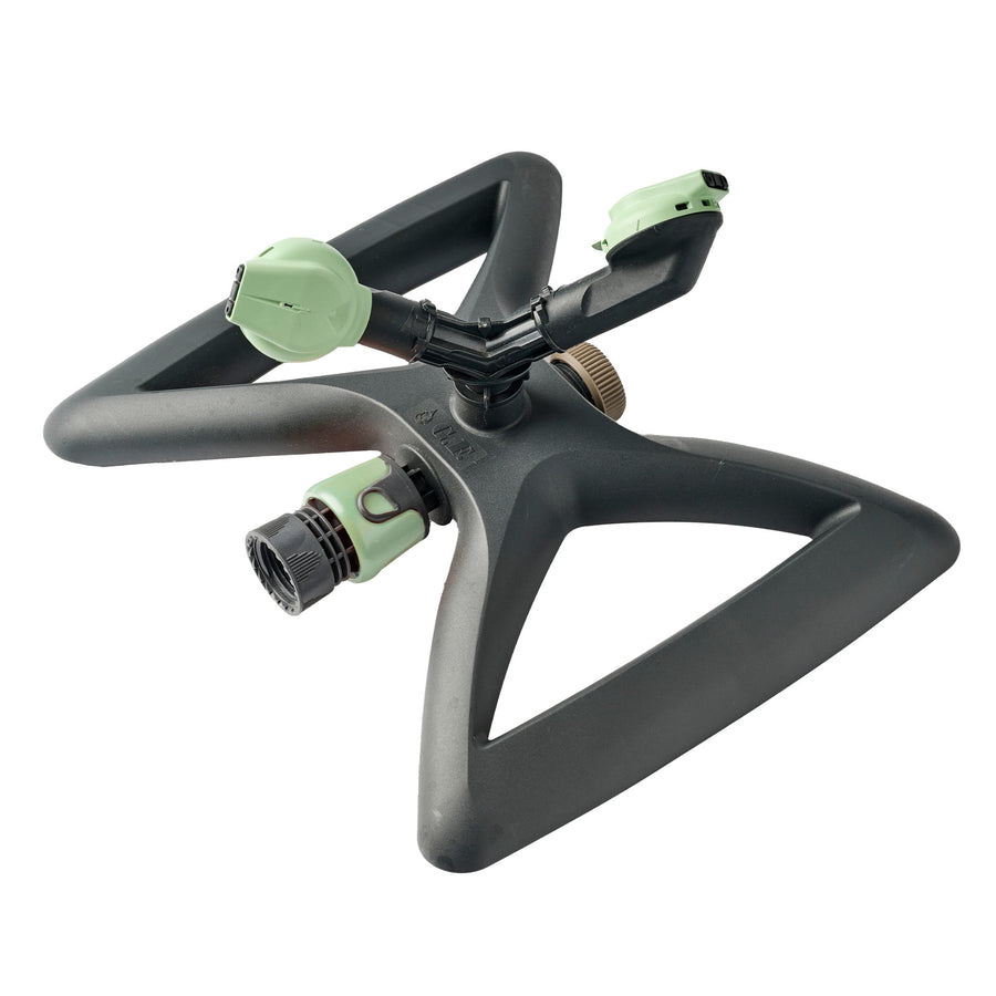 Mint-green and black rotating garden sprinkler on a white background, three-arm spray head and triangular base visible.