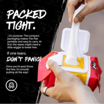 Hands pulling a wipe from a Klean Freak soft pack with overlay text about tight packing and pull technique