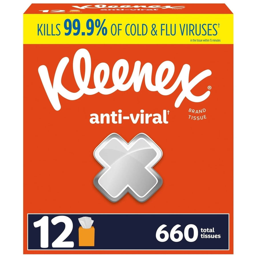 Front-facing orange Kleenex anti-viral carton showing brand logo, silver X emblem and '12' pack/660 tissues panel