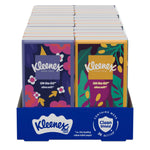 Close-front view of Kleenex On-The-Go pocket tissue display tray showing floral and leaf patterned pocket packs