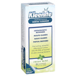 Angled Kleenite dental cleanser box showing front panel with product benefits and fresh mint graphic
