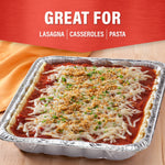 Cooked lasagna in a Handi-Foil aluminum pan on a wooden surface with a red banner reading "Great For" above