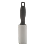 Single lint roller with a dark gray ergonomic handle and white adhesive roll against a white background