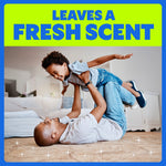 Smiling adult lifting child above a clean carpet with headline “LEAVES A FRESH SCENT” and sparkling floor accents