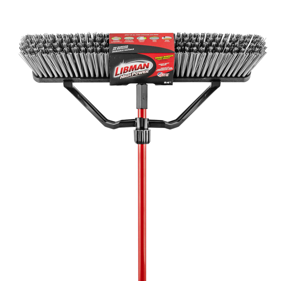 Close-up front view of a Libman 24-inch heavy-duty push broom head with dense black and gray bristles and red handle