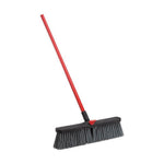 Angled view of a red Libman outdoor push broom with grey bristles and a black broom head against a white background.
