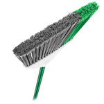 Detail view of Libman broom bristles showing grey and green angled fibers and the green handle attachment.