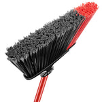 Close-up angled view of Libman broom head showing dense black and red bristles and red handle