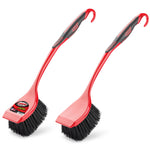 Two red and black Libman long-handled scrub brushes on white background
