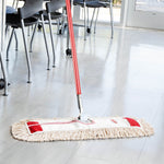 Libman 24-inch cotton dust mop with red steel handle in use on a tiled floor in a bright indoor setting.