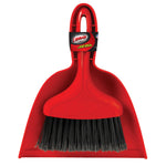 Front-facing red dustpan holding a red whisk broom with black bristles and Libman label