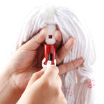 Close-up of hands showing the plastic connector of a red mop handle being secured into a white mop refill