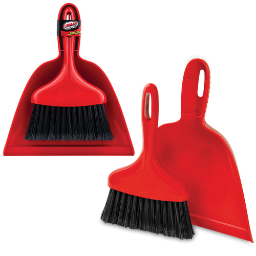 Red Libman dustpan with matching red whisk broom with black bristles on white background