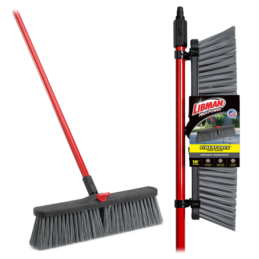Red-handled Libman push broom with grey stiff bristles and retail label, shown full head and handle detail.