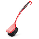 Red Libman long-handled scrub brush with curved hook handle on white background