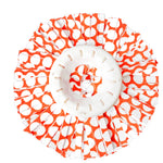 Top view of a circular Libman spin mop refill head with orange and white polka-dot microfiber strips