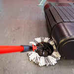 Libman spin mop refill attached to mop base cleaning textured floor beside treadmill, close-up of gray and white microfiber head