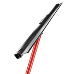 Close-up angled view of a red-handle squeegee showing the black rubber double-edged flex blade and head connection