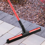 Libman red-handle squeegee used outdoors on pavers, showing flex rubber blade contacting surface