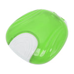 Closed light green and white shell-shaped dental retainer case on white background