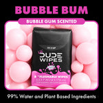 Lil' DUDE Wipes pocket pack staged among pink plastic balls with 'Bubble Bum' and 'Bubble Gum scented' branding visible.