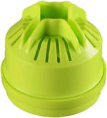 Macro view of a lime-green plastic lure cartridge top with slots and funnel-shaped vents on white background