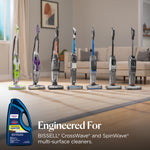 Row of several BISSELL multi-surface cleaners displayed in a living room scene with product bottle inset and 'Engineered For' text