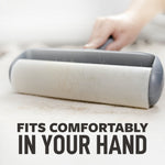 Close-up of a lint roller removing short hairs from upholstery with caption “fits comfortably in your hand”