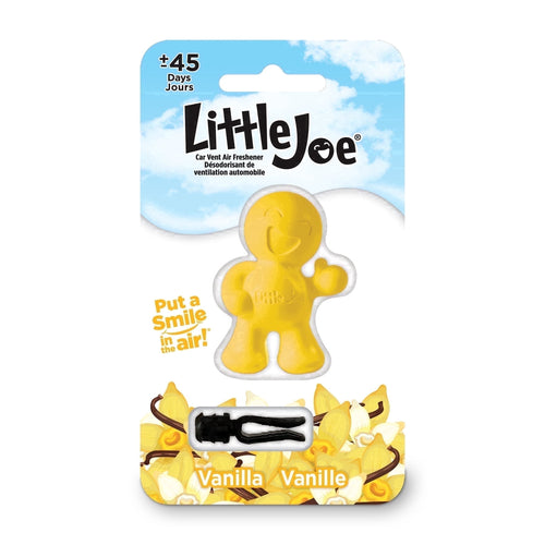 Little Joe yellow smiling figurine car air freshener on retail card with vanilla blossoms and sky background
