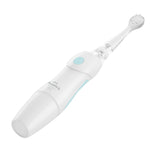 Angled view of a Little Martin's white electric toothbrush showing textured silicone brush head and blue button